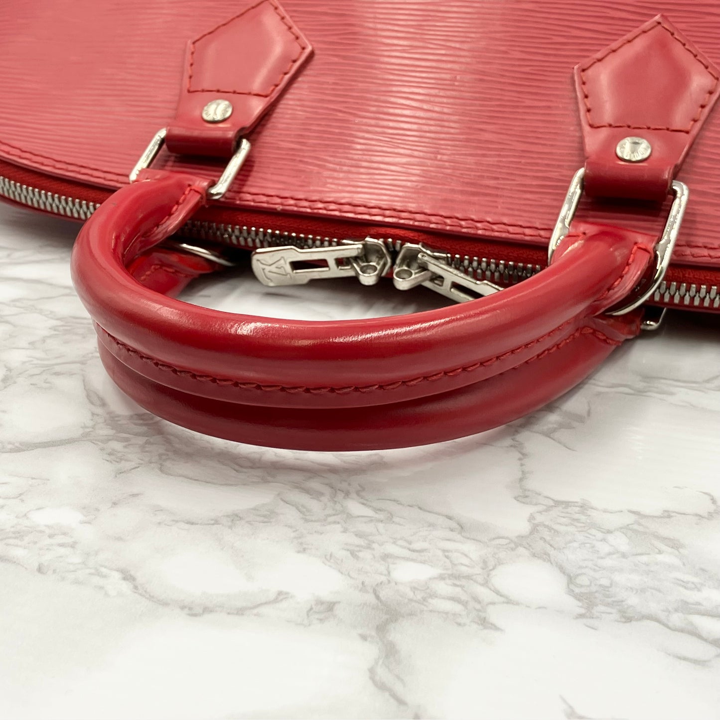 LOUIS VUITTON Epi Alma PM Handbag