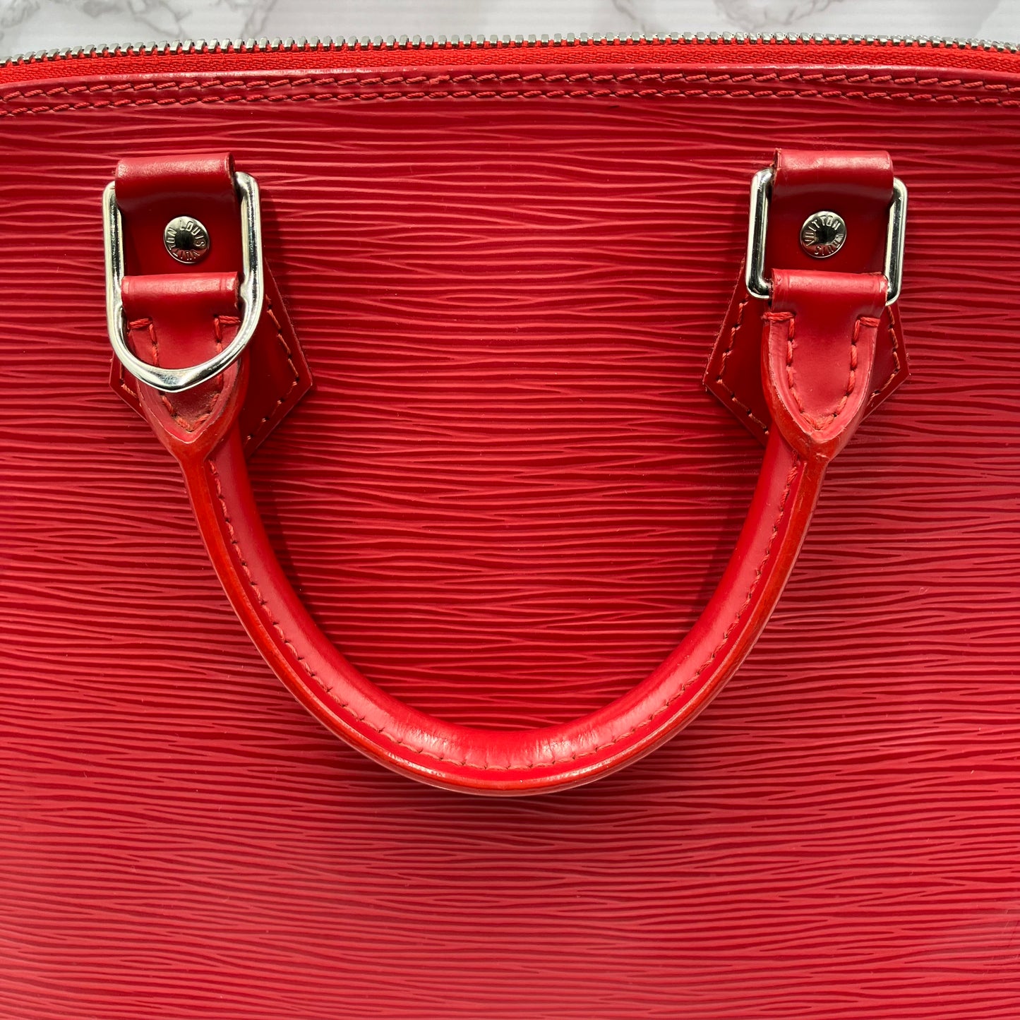 LOUIS VUITTON Epi Alma PM Handbag