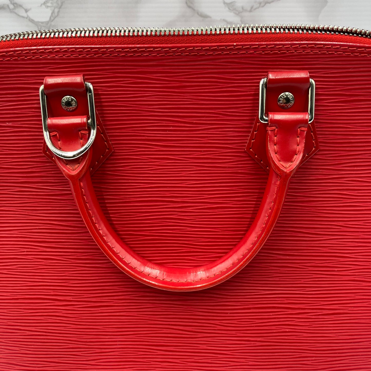 LOUIS VUITTON Epi Alma PM Handbag