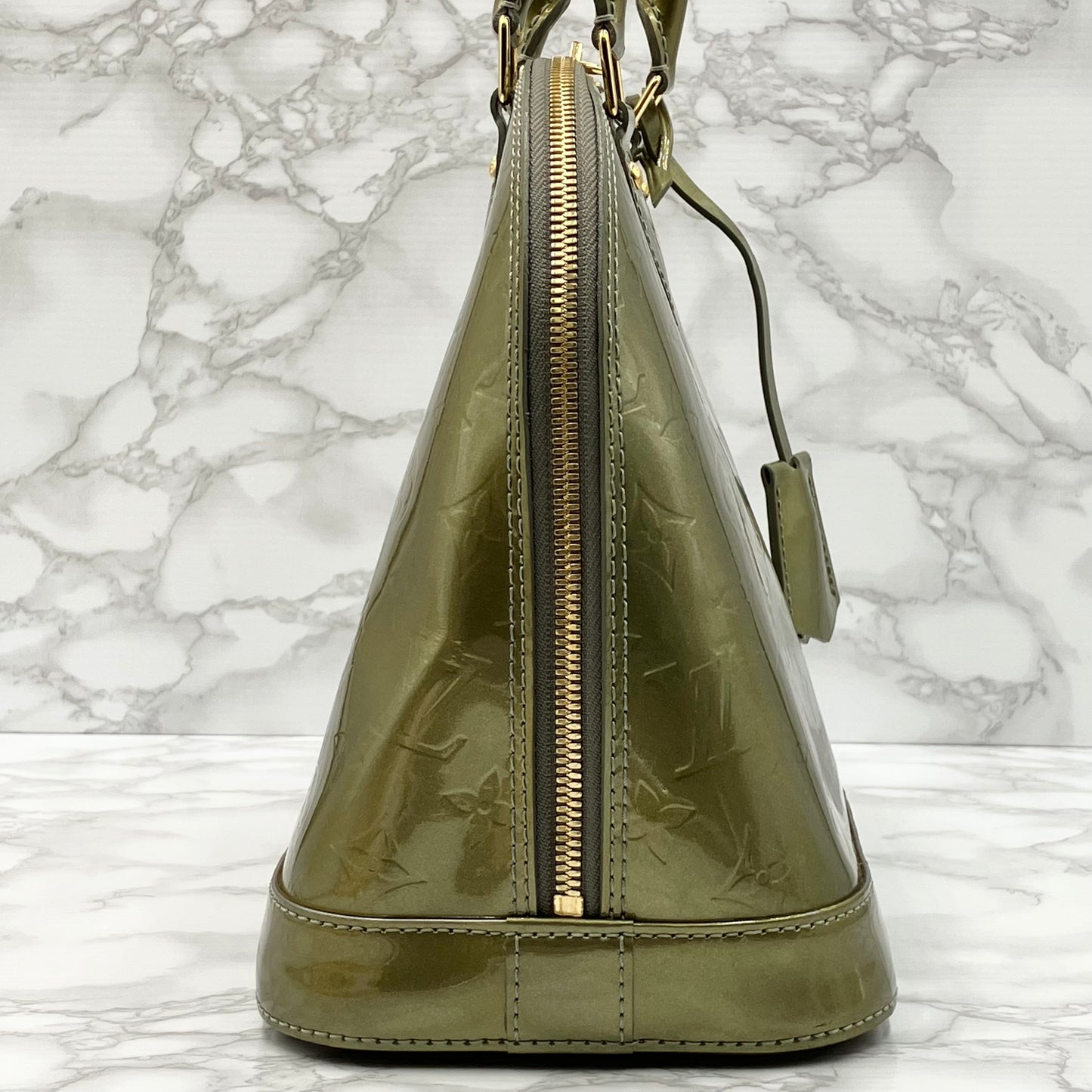 LOUIS VUITTON Vernis Alma handbag