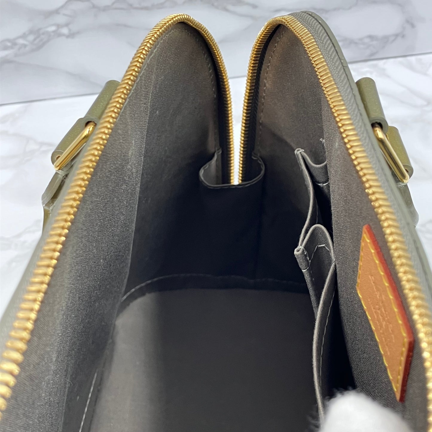 LOUIS VUITTON Vernis Alma handbag